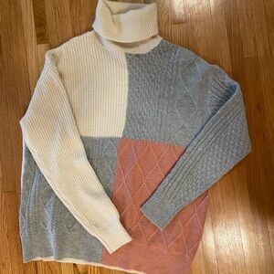 Vici Patchwork Turtleneck Sweater in Cream, Gray, and Pink